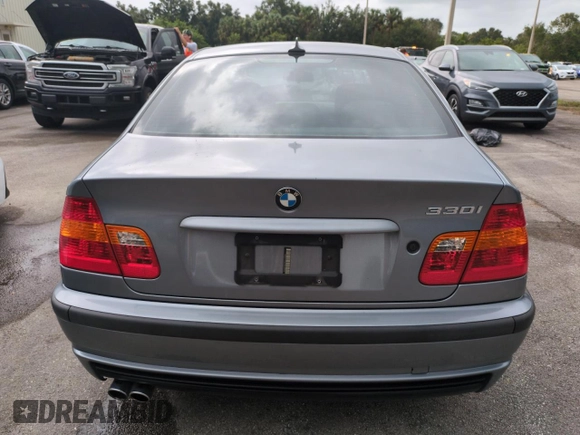 2005 BMW 3 Series 330i with VIN WBAEV53455KM42056, listed as a Copart auction lot 75910624 with 136,892 mi miles and Salvage Title. Bid and sale history available at carsss.com. Image 6.
