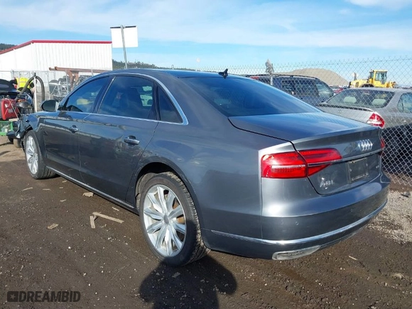 2016 Audi A8 L 3.0T with VIN WAU34AFD0GN005520, listed as a IAAI auction lot 41689248 with 76,150 mi miles. Bid and sale history available at carsss.com. Image 3.
