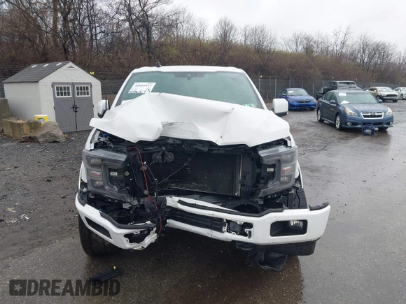2019 Ford F-150 XL with VIN 1FTEW1E58KFC00154, listed as a IAAI auction lot 41051975 with 57,746 mi miles and . Bid and sale history available at DreamBid. Image 12.