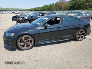 2023 Audi RS 5 Sportback z VIN WUAAWCF54PA900981, wystawiony jako Copart lot #62860383 z przebiegiem 4779 mil mil oraz . Historia ofert i sprzedaży dostępna na DreamBid. Obrazek 1.
