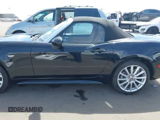 2019 FIAT 124 Spider Lusso z VIN JC1NFAEK6K0143183, wystawiony jako IAAI lot #42173832 z przebiegiem 3 574 mil mil oraz . Historia ofert i sprzedaży dostępna na DreamBid. Obrazek 14.