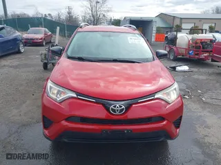 2016 Toyota RAV4 LE with VIN JTMBFREV2GJ097058, listed as a IAAI auction lot 41720372 with 118,606 mi miles. Bid and sale history available at carsss.com. Image 13.