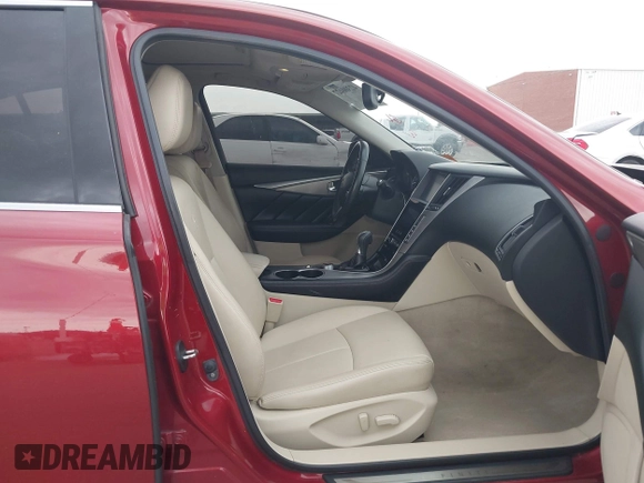 2014 Infiniti Q50 Premium z VIN JN1BV7AP8EM673359, wystawiony jako IAAI lot #42300427 z przebiegiem 118 779 mil mil oraz . Historia ofert i sprzedaży dostępna na DreamBid. Obrazek 5.