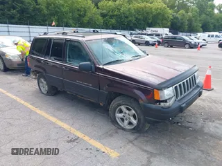 1997 Jeep Grand Cherokee Laredo with VIN 1J4GZ58S0VC708420, listed as a IAAI auction lot 42624603 with Not provided miles and . Bid and sale history available at DreamBid. Image 1.