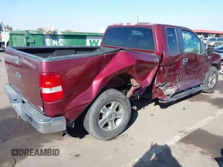 2005 Ford F-150 XLT with VIN 1FTPX12565NA45477, listed as a IAAI auction lot 41448417 with 145,039 mi miles. Bid and sale history available at carsss.com. Image 4.