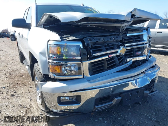 2014 Chevrolet Silverado 1500 LT with VIN 1GCVKREC0EZ151088, listed as a IAAI auction lot 41763808 with 124,668 mi miles and . Bid and sale history available at DreamBid. Image 6.