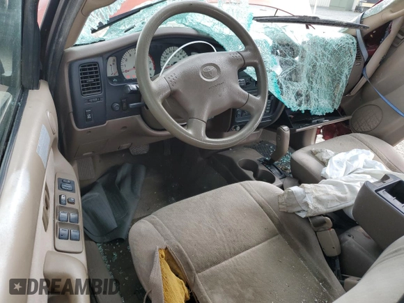 2003 Toyota Tacoma PreRunner with VIN 5TEGN92N03Z232888, listed as a Copart auction lot 62316565 with 281,137 mi miles and Salvage title. Bid and sale history available at DreamBid. Image 8.