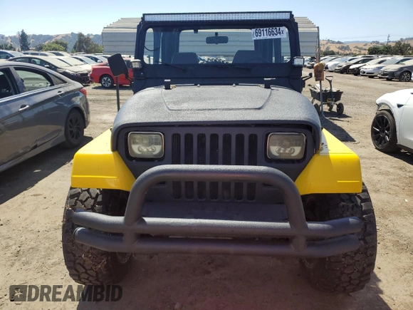 1992 Jeep Wrangler z VIN 2J4FY19P1NJ533862, wystawiony jako Copart lot #69116634 z przebiegiem 105 340 mil mil oraz Czysty tytuł • Clean title. Historia ofert i sprzedaży dostępna na DreamBid. Obrazek 5.