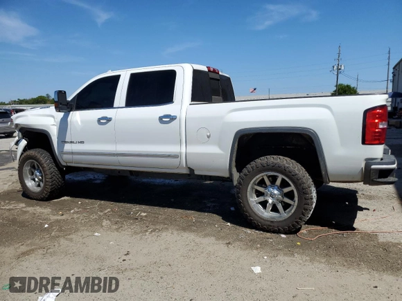 2016 GMC Sierra 2500HD Denali z VIN 1GT12UE84GF106026, wystawiony jako Copart lot #50755335 z przebiegiem 127 039 mil mil oraz Szkoda całkowita • Salvage title. Historia ofert i sprzedaży dostępna na DreamBid. Obrazek 2.