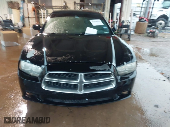 2014 Dodge Charger SE with VIN 2C3CDXBG8EH240828, listed as a IAAI auction lot 42158404 with 211,686 mi miles and . Bid and sale history available at DreamBid. Image 6.