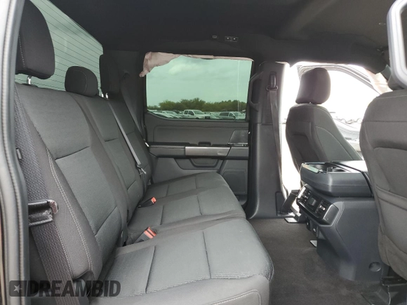 2023 Ford F-150 XL z VIN 1FTEW1CP9PKD18927, wystawiony jako Copart lot #54132925 z przebiegiem 57 592 mil mil oraz Szkoda całkowita • Salvage title. Historia ofert i sprzedaży dostępna na DreamBid. Obrazek 10.