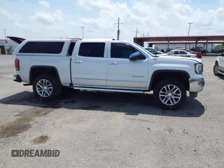 2018 GMC Sierra 1500 SLT z VIN 3GTU2NEC9JG240754, wystawiony jako IAAI lot #41890229 z przebiegiem 183 966 mil mil oraz . Historia ofert i sprzedaży dostępna na DreamBid. Obrazek 13.