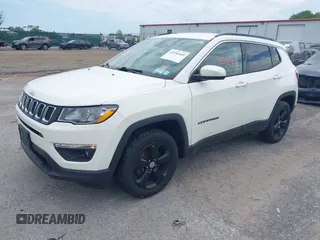 2019 Jeep Compass Latitude with VIN 3C4NJDBB8KT684116, listed as a IAAI auction lot 42596469 with 73,219 mi miles and . Bid and sale history available at DreamBid. Image 2.