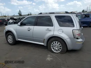 2010 Mercury Mariner Premier with VIN 4M2CN8HG3AKJ06165, listed as a Copart auction lot 50501905 with 229,937 mi miles and Salvage title. Bid and sale history available at DreamBid. Image 2.
