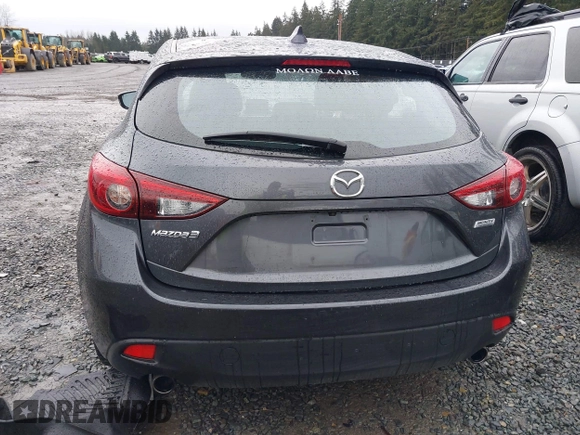 2016 Mazda 3 S Grand Touring z VIN JM1BM1N37G1351062, wystawiony jako IAAI lot #41573775 z przebiegiem 68 634 mil mil oraz . Historia ofert i sprzedaży dostępna na DreamBid. Obrazek 16.