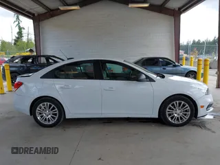 2015 Chevrolet Cruze LS z VIN 1G1PA5SG6F7278428, wystawiony jako IAAI lot #42325454 z przebiegiem 87 930 mil mil oraz . Historia ofert i sprzedaży dostępna na DreamBid. Obrazek 13.