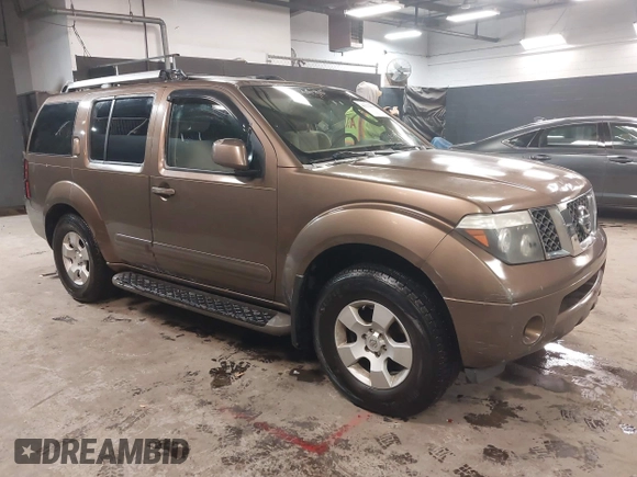 2005 Nissan Pathfinder SE z VIN 5N1AR18W65C703936, wystawiony jako IAAI lot #41271670 z przebiegiem 129 744 mil mil oraz . Historia ofert i sprzedaży dostępna na DreamBid. Obrazek 1.