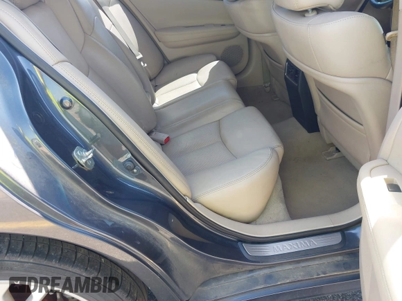 2013 Nissan Maxima SV with VIN 1N4AA5AP5DC815847, listed as a IAAI auction lot 42758399 with 168,056 mi miles and . Bid and sale history available at DreamBid. Image 8.