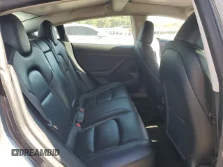 2023 Tesla Model 3 с VIN 5YJ3E1EAXPF607931, выставлен на аукционе Copart как лот 52629305 с пробегом 87 785 миль миль и Списание • Salvage title. История ставок и продаж доступна на DreamBid. Изображение 10.