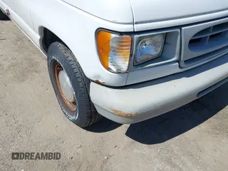 1999 Ford Econoline Cargo with VIN 1FTRE1421XHB21609, listed as a IAAI auction lot 42070347 with 103,104 mi miles. Bid and sale history available at carsss.com. Image 6.