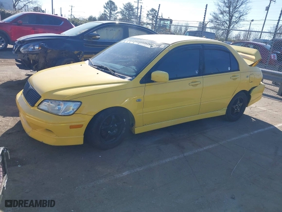2003 Mitsubishi Lancer OZ-Rally with VIN JA3AJ86E23U079315, listed as a IAAI auction lot 41408040 with 130,356 mi miles. Bid and sale history available at carsss.com. Image 2.
