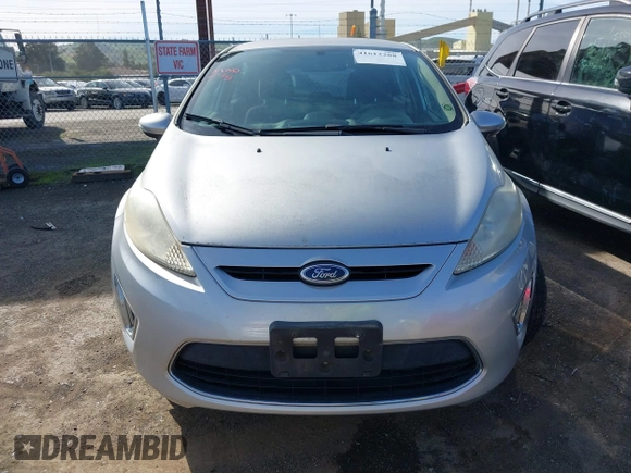 2011 Ford Fiesta SES with VIN 3FADP4FJ1BM149138, listed as a IAAI auction lot 41612288 with 131,798 mi miles. Bid and sale history available at carsss.com. Image 12.