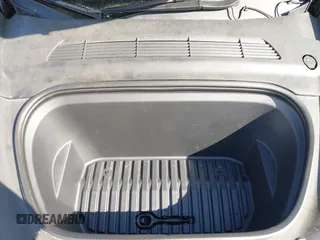 2022 Tesla Model Y Long Range z VIN 7SAYGDEE7NA006476, wystawiony jako IAAI lot #41894606 z przebiegiem 63 380 mil mil oraz . Historia ofert i sprzedaży dostępna na DreamBid. Obrazek 10.