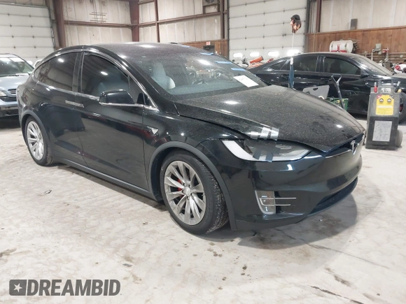 2019 Tesla Model X P90D with VIN 5YJXCAE4XKF180356, listed as a IAAI auction lot 42087926 with 79,041 mi miles. Bid and sale history available at carsss.com. Image 1.