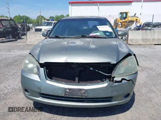 2005 Nissan Altima SL z VIN 1N4AL11D05N911352, wystawiony jako IAAI lot #42132763 z przebiegiem Nie podano mil oraz . Historia ofert i sprzedaży dostępna na DreamBid. Obrazek 6.