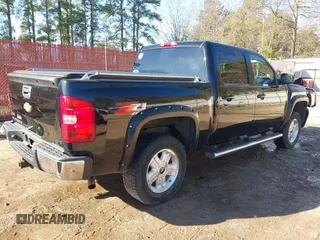 2011 Chevrolet Silverado 1500 LT with VIN 3GCPKSE33BG320029, listed as a IAAI auction lot 41805671 with 110,000 mi miles. Bid and sale history available at carsss.com. Image 4.