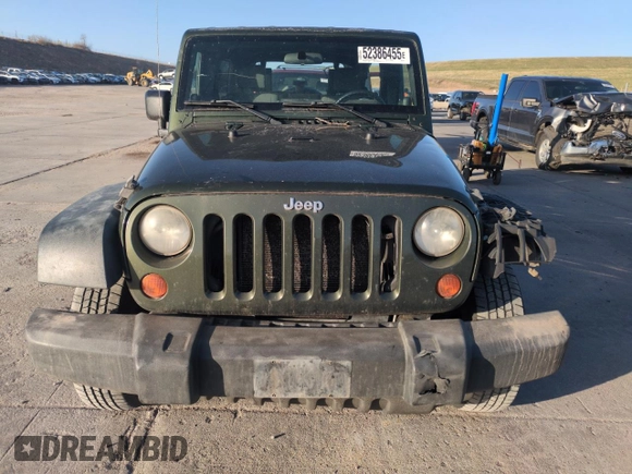 2008 Jeep Wrangler Unlimited X with VIN 1J4GA39108L509275, listed as a Copart auction lot 52386455 with 220,829 mi miles and Salvage Title. Bid and sale history available at carsss.com. Image 5.