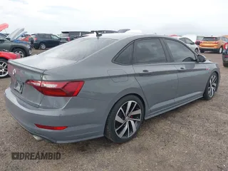 2021 Volkswagen Jetta GLI S with VIN 3VW6T7BU8MM011418, listed as a IAAI auction lot 40474082 with 76,619 mi miles and . Bid and sale history available at DreamBid. Image 4.