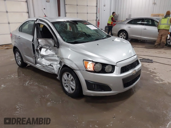 2014 Chevrolet Sonic LT with VIN 1G1JC5SG8E4107664, listed as a IAAI auction lot 41614306 with 128,946 mi miles and . Bid and sale history available at DreamBid. Image 1.