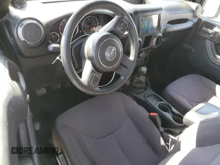2014 Jeep Wrangler Sport with VIN 1C4AJWAG5EL192554, listed as a Copart auction lot 52501535 with 117,038 mi miles and Salvage Title. Bid and sale history available at carsss.com. Image 8.
