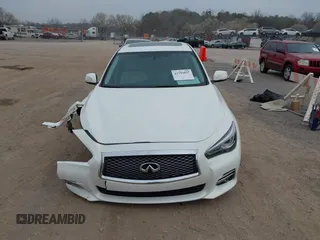 2015 Infiniti Q50 Premium with VIN JN1BV7AP3FM349396, listed as a IAAI auction lot 41793057 with 133,372 mi miles. Bid and sale history available at carsss.com. Image 12.