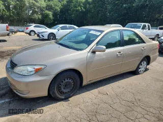 2004 Toyota Camry LE with VIN 4T1BE32K94U854652, listed as a Copart auction lot 61979535 with 88,638 mi miles and Salvage title. Bid and sale history available at DreamBid. Image 1.