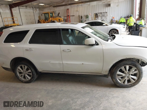 2013 Dodge Durango Crew z VIN 1C4SDJDT3DC540700, wystawiony jako IAAI lot #42097270 z przebiegiem 197 195 mil mil oraz . Historia ofert i sprzedaży dostępna na DreamBid. Obrazek 13.