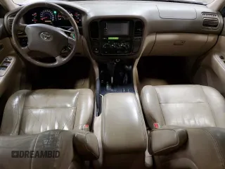 2002 Toyota Land Cruiser z VIN JTEHT05J922018964, wystawiony jako Copart lot #60111015 z przebiegiem 245 890 mil mil oraz Czysty tytuł • Clean title. Historia ofert i sprzedaży dostępna na DreamBid. Obrazek 8.