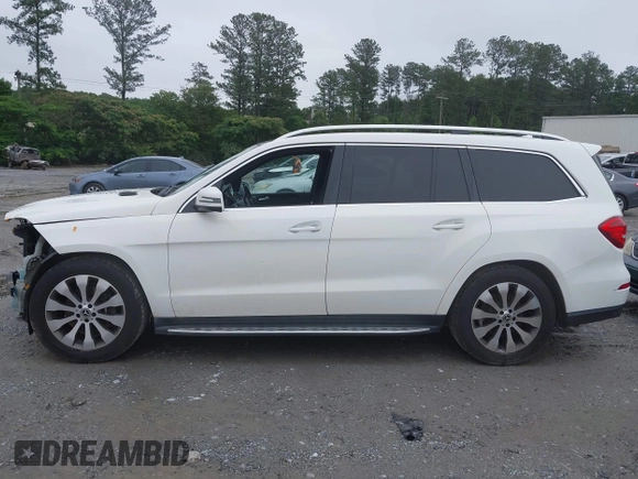 2018 Mercedes-Benz GLS 450 with VIN 4JGDF6EE2JB104367, listed as a IAAI auction lot 42351124 with 141,031 mi miles and . Bid and sale history available at DreamBid. Image 14.