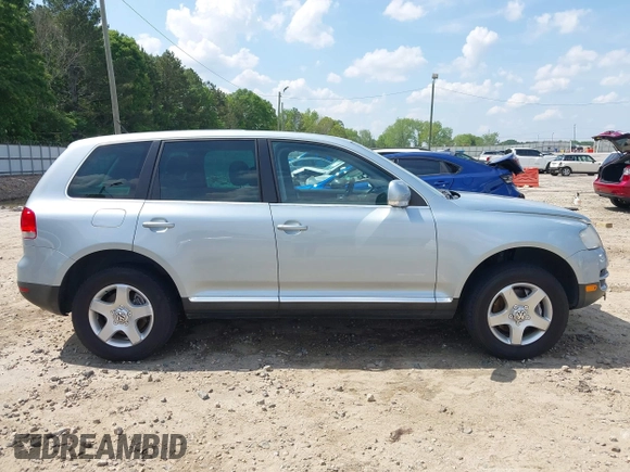 2007 Volkswagen Touareg V6 z VIN WVGZE77L57D000964, wystawiony jako IAAI lot #42159667 z przebiegiem 143 542 mil mil oraz . Historia ofert i sprzedaży dostępna na DreamBid. Obrazek 13.