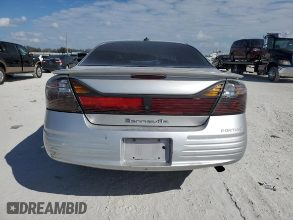 2003 Pontiac Bonneville SE z VIN 1G2HX54K534151957, wystawiony jako Copart lot #45339075 z przebiegiem 172 969 mil mil oraz Nie do naprawy • Non repairable. Historia ofert i sprzedaży dostępna na DreamBid. Obrazek 6.