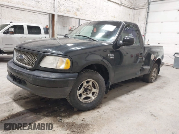 2001 Ford F-150 with VIN 2FTRF07W01CA32084, listed as a IAAI auction lot 42283557 with Not provided miles and . Bid and sale history available at DreamBid. Image 2.