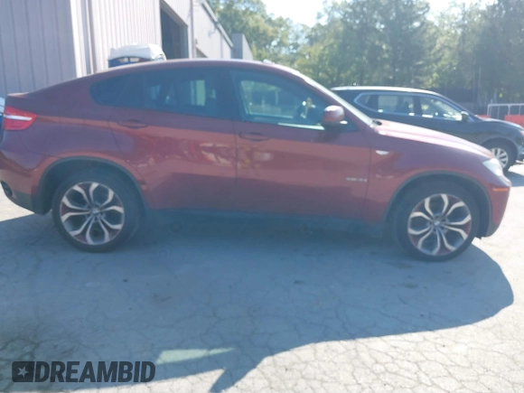 2014 BMW X6 xDrive35i z VIN 5UXFG2C57E0C44052, wystawiony jako IAAI lot #40231766 z przebiegiem 131 573 mil mil oraz . Historia ofert i sprzedaży dostępna na DreamBid. Obrazek 14.