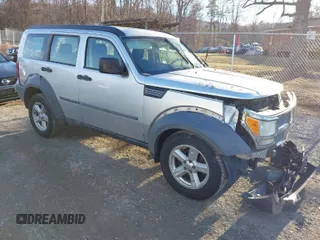 2007 Dodge Nitro SXT with VIN 1D8GU28K67W740794, listed as a IAAI auction lot 41591855 with 162,709 mi miles. Bid and sale history available at carsss.com. Image 1.