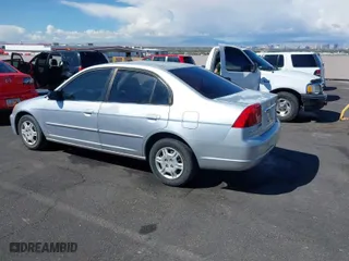 2002 Honda Civic LX with VIN 2HGES16692H595903, listed as a IAAI auction lot 41916850 with 168,861 mi miles. Bid and sale history available at carsss.com. Image 3.