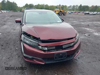 2018 Honda Clarity z VIN JHMZC5F12JC021958, wystawiony jako IAAI lot #42191071 z przebiegiem 29 423 mil mil oraz . Historia ofert i sprzedaży dostępna na DreamBid. Obrazek 12.