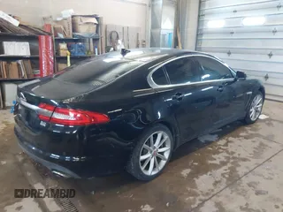 2015 Jaguar XF V6 Portfolio with VIN SAJWJ0FF5F8U57756, listed as a IAAI auction lot 41631278 with 47,158 mi miles. Bid and sale history available at carsss.com. Image 4.