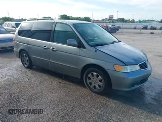 2001 Honda Odyssey EX z VIN 2HKRL18601H516859, wystawiony jako IAAI lot #42122352 z przebiegiem 195 730 mil mil oraz . Historia ofert i sprzedaży dostępna na DreamBid. Obrazek 1.