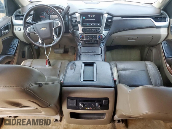 2015 Chevrolet Tahoe LTZ z VIN 1GNSCCKC8FR102859, wystawiony jako Copart lot #56755555 z przebiegiem 167 191 mil mil oraz Czysty tytuł • Clean title. Historia ofert i sprzedaży dostępna na DreamBid. Obrazek 8.
