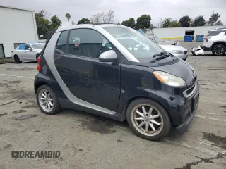 2008 Smart fortwo Passion z VIN WMEEK31X08K089762, wystawiony jako Copart lot #44005435 z przebiegiem 57 192 mil mil oraz Szkody całkowita. Historia ofert i sprzedaży dostępna na DreamBid. Obrazek 4.